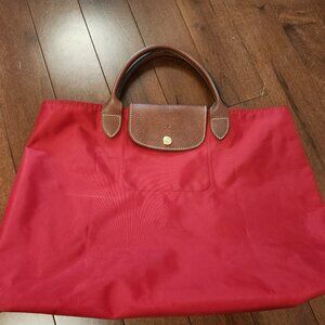 Longchamp Le Pliage cabast red tote bag